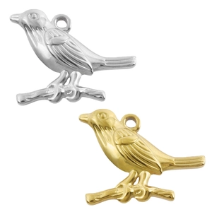 Macro detail of bird-shaped 304 stainless steel pendants in polished gold and silver finish
