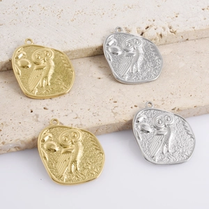 Detailed relief of 304 stainless steel owl charms in gold and silver finishes