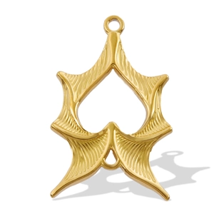 Macro view of gold 304 stainless steel bat wing pendant with detailed texture