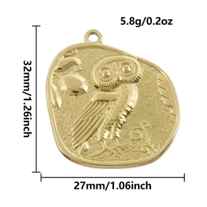 Detail view of 18k gold owl pendant with 32mm height and 5.8g weight dimensions