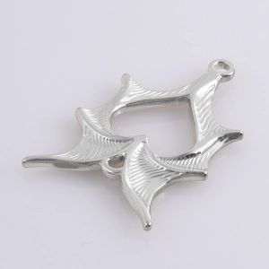 Detailed close-up of 304 stainless steel bat wings pendant with heart cutout and texture