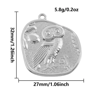 Macro view of 304 stainless steel owl pendant showing embossed details and measurements