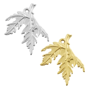 Macro shot of 304 stainless steel leaf pendants with fine vein texture in gold and silver