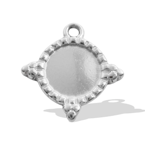 Detailed macro view of a silver rhobmus pendant with ornate radial edges for DIY necklaces