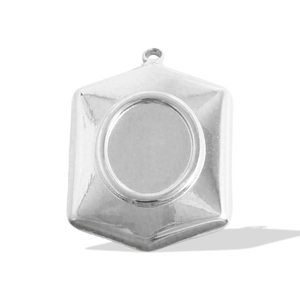 Macro view of a hexagonal stainless steel pendant base with an oval jewelry setting
