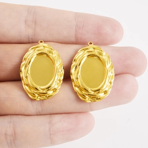 Polished gold stainless steel oval pendant base with twisted rope edge for DIY jewelry