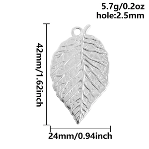 Macro detail of stainless steel leaf pendant showing realistic veins and 42mm size