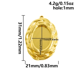 Macro detail of 304 stainless steel gold oval pendant base with spiral textured edges