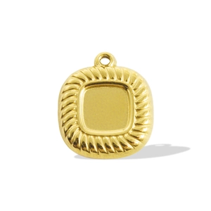 Macro detail of golden square stainless steel pendant with textured rope edge design
