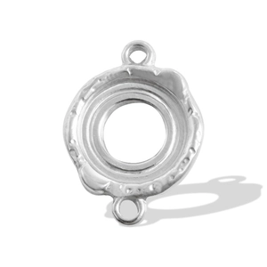 Macro detail of irregular silver circular connector for DIY jewelry making