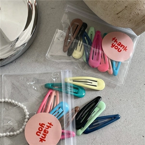 Lot de 10 barrettes BB colorées aux tons crème dans un emballage cadeau délicat