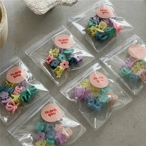 10-piece set of macaron mini flower hair clips in various pastel jelly colors