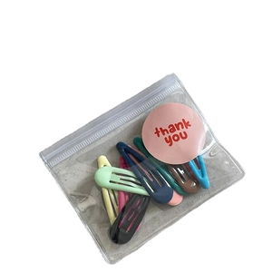 Lot de 10 pinces à cheveux gouttes en couleurs crème assorties avec sachet d'emballage