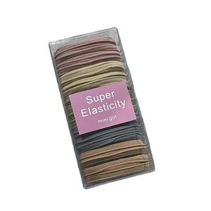 Set of 10 multicolor high elasticity hair ties in a clear box with mini girl labels