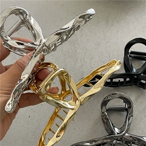 Polished alloy liquid metal hair claw clips in silver gold black and grey finishes