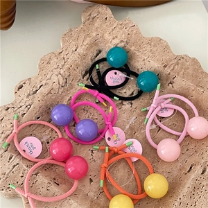 Detail of colorful jelly bead elastic hair ties set with glossy finish beads