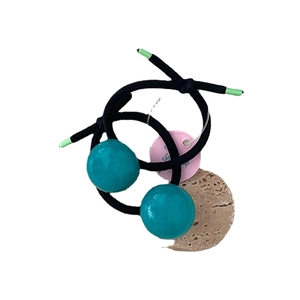 Set of two elastic hair ties with glossy teal resin round beads in a creamy Korean style