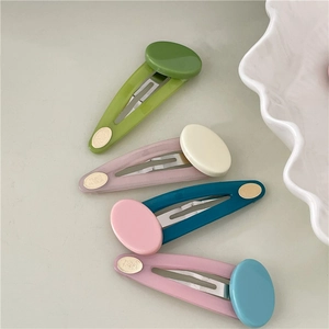 Set of four colorful jelly oval BB hair clips in pastel green, purple, blue, and pink