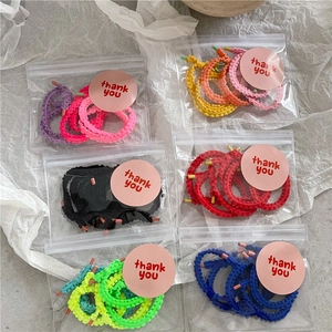 Élastiques à cheveux colorés en spirale en sachets avec stickers de merci