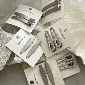 Minimalist silver metal hair clips set with geometric wave and rectangle shapes