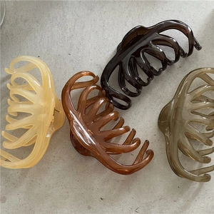 Elegant large octopus hair claw clips for women in four neutral colors for thick hair