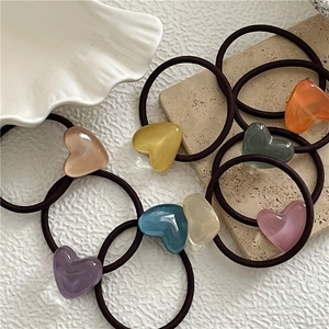 Colorful heart resin hair ties set with high-elastic brown bands on white background