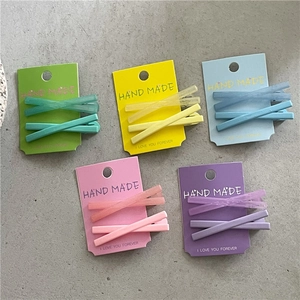 Lot de 5 sets de barrettes macaron aux textures mates et résine sur cartes colorées