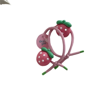 Cute pink strawberry hair ties set for kids featuring white dots and green leaves charms
