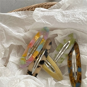 Set of five elegant acetate resin hair clips in various patterns for women