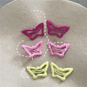 Cute cream colored butterfly hair clips set in pink and yellow for girls and women