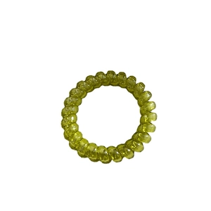 Élastique à cheveux spirale vert translucide avec texture gelée et fini brillant