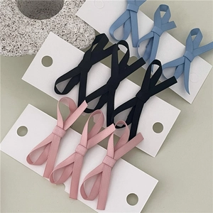 Three-set fabric bow hair clips in pink, black, and blue colors for women styling