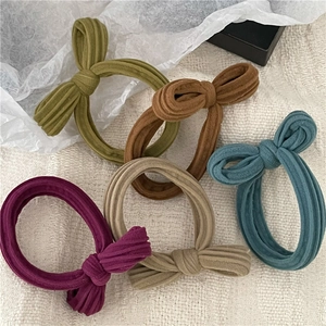 Set of 5 textured ribbed fabric hair ties with rabbit ear bows in vintage colors