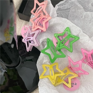 Colorful star-shaped glitter hair clips and solid color hair accessories for girls