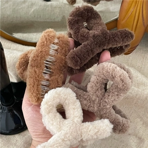 Plush faux fur cross hair claws in assorted warm coffee and neutral tones for autumn