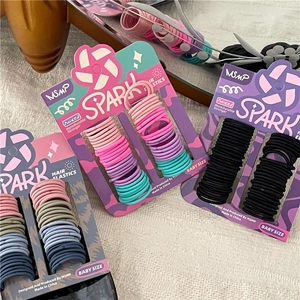 Detailed set of multi-color high elastic baby hair ties on display cards