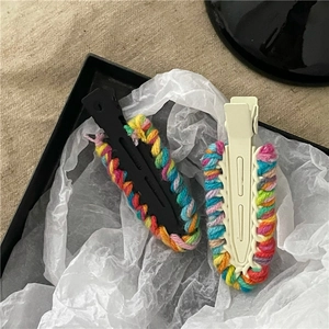 Fermagli per capelli in lana intrecciata colorata nero e crema per donne alla moda