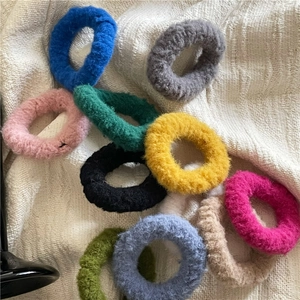 Colorful plush velvet hair scrunchies set in ten vibrant soft cream colors for women