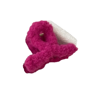 Plush faux fur cross hair claw clip in rose red color for winter hair styling