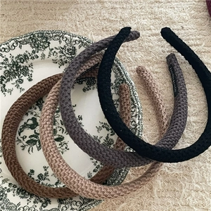 Detail showing knitted texture and hand made label on thick padded headbands