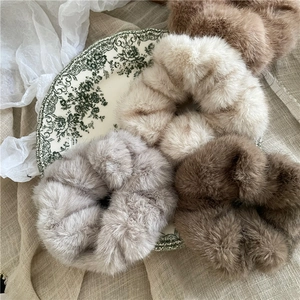 Faux mink fur scrunchies set in neutral tones for elegant autumn and winter styling