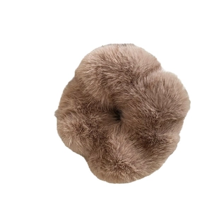 Plush faux mink fur scrunchie in light brown, soft winter hair tie with ruffled texture