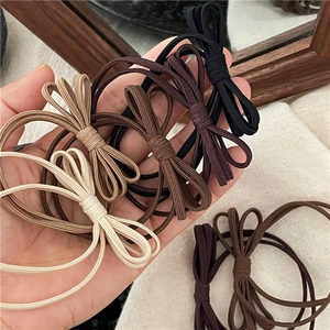 Chouchous élastiques à nœuds dans les tons café, couleurs noir, marron et beige