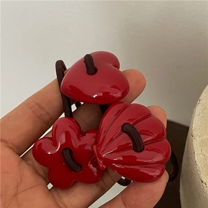 Three-piece red hair tie set featuring cute heart, flower, and shell charms for girls