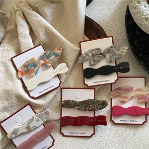 Lot de barrettes en acétate à motifs de vagues aux tons marbre et ambre