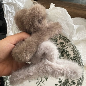 Faux mink fur hair claw clips in dark brown and light grey-purple plush textures