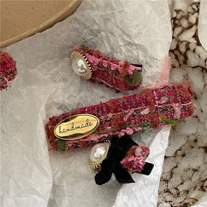 Handmade rose pink tweed bow hair clips set with vintage pearls and gold accents