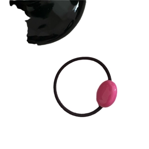 Elastic hair tie with pink oval resin bead accessory for stylish ponytails