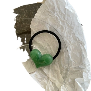 Sweet green heart-shaped elastic hair tie with durable black rubber band for girls