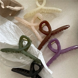 Crossed jelly texture hair claws in six colors including beige, green and chocolate